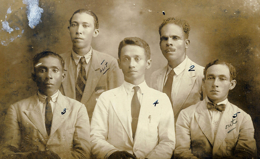 Studio potrait photography of five men in white suits
